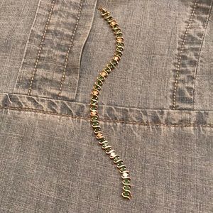 14k HEAVY GOLD EMERALD & DIAMOND TENNIS BRACELET.